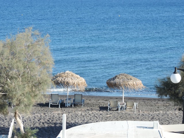 The black sand beach in front of our hotel at Perivolos