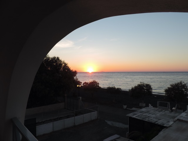 Enjoying the sunrise from the balcony at Perivolos