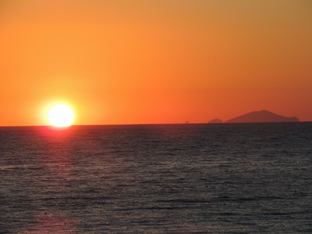 Enjoying the sunrise from the balcony at Perivolos