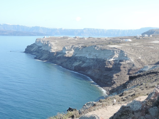 The remaining island was covered with up to 50 m (165 ft) of white ash.