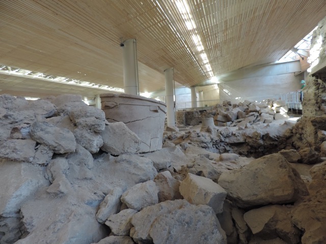 A bathtub and a shot of the roof over the dig site.