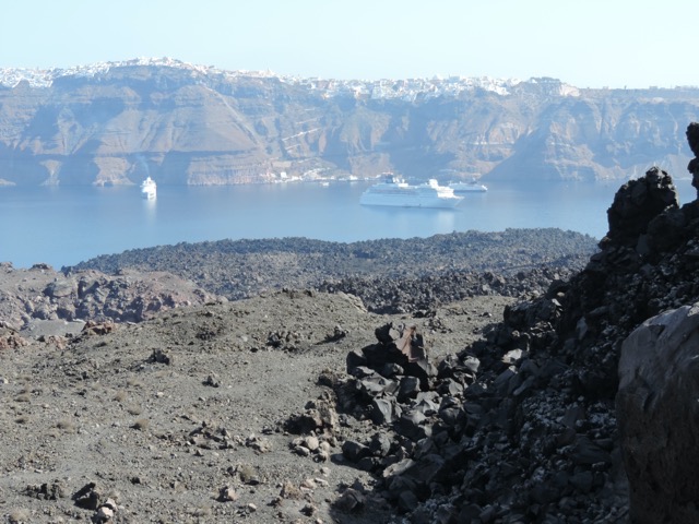 A view back to Fira. Nothing grows on this hot dusty lava rock.
